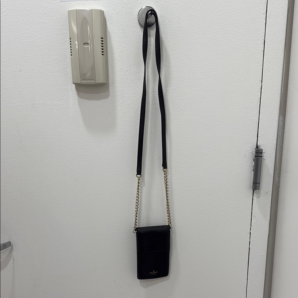 Kate Spade Black and Gold Crossbody Bag Minimalist Design
